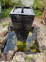 Large glazed water feature pot