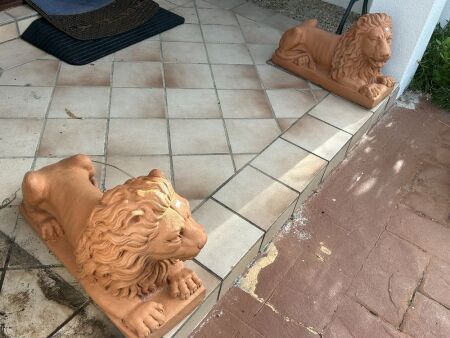 Pair of terracotta lion statues