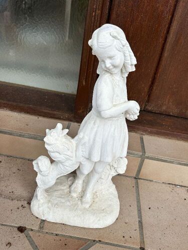 Girl and dog concrete statue