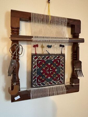 Vintage wooden loom with tools