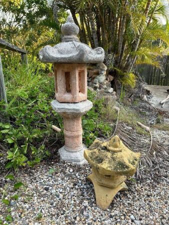 2 temple style concrete statues