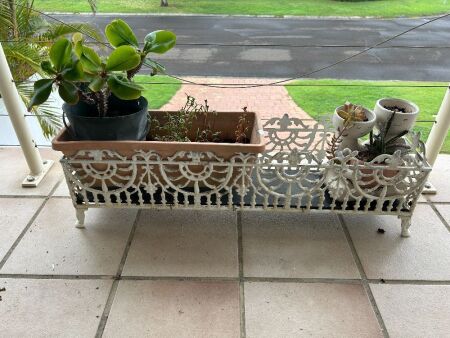 Cast alloy planter box with plants