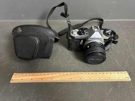 Vintage PENTAX ME Super SLR camera with 590mm ASAHI lens and leather case