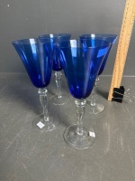 Set of 4 long stemmed royal blue flutes