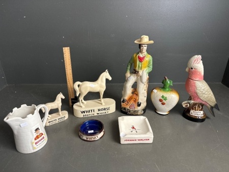 Assorted lot of shaped ceramic whisky decanters, ash trays and display models