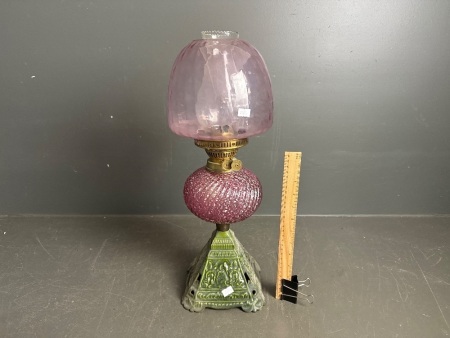 Vintage double burner Duplex (England) oil lamp with enamelled iron base, speckled glass font, pink glass shade and brass burner