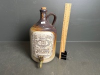 Jack Daniels stoneware semi-glazed demijohn with brass tap