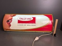 Tally Ho Licked by Millions Light up Neon Sign