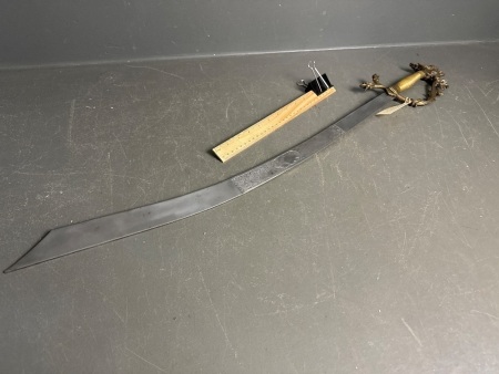 Vintage ceremonial sword with brass dragon hilt