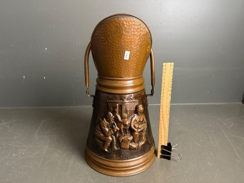 Beaten copper coal scuttle with embossed family scene