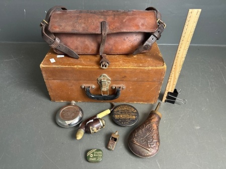 Interesting assorted lot in box inc. copper whistle, powder flask, smoking pipe, leather Triumph bag etc