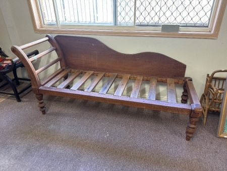 Vintage wooden day bed on turned legs