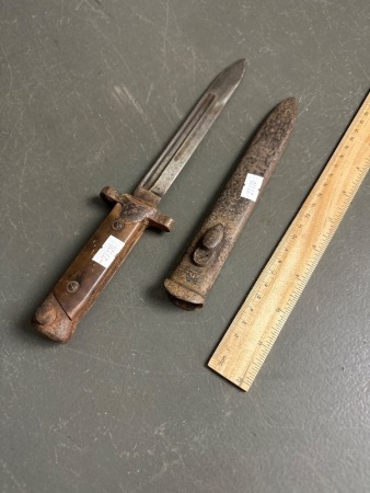 Military bayonet/knife marked E 74602 and metal scabbard