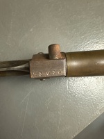 French bayonet/sword with brass handle and metal scabbard - marked with makers mark and numbered 3050 - 6