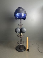 Abstract sculpture made from chain, helmet, weight, horseshoes etc - lights up - 2