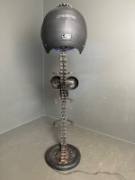 Abstract sculpture made from chain, helmet, weight, horseshoes etc - lights up - 5