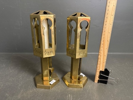 Pair of brass Middle Eastern adjustable candle sticks