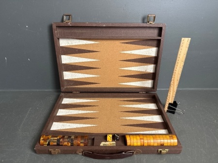 Vintage backgammon set with cork board and bakelite disks