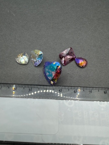 54 carats MYSTIC TOPAZ Gemstones. Note diffusion treated to enhance vibrant colors