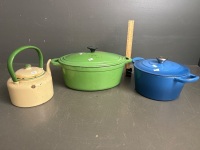 Two Large Cast Iron Cassorole Dishes and Kettle