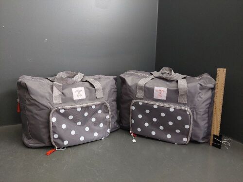 Quality pair of "La Maison Du Voyage" waterproof travel luggage with zipped spotted side. Personal Storage - (unused) 