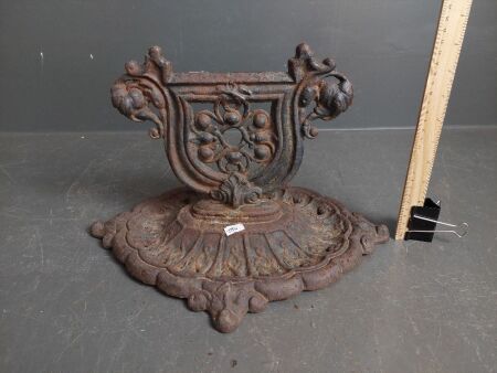 Ornate cast iron boot scraper