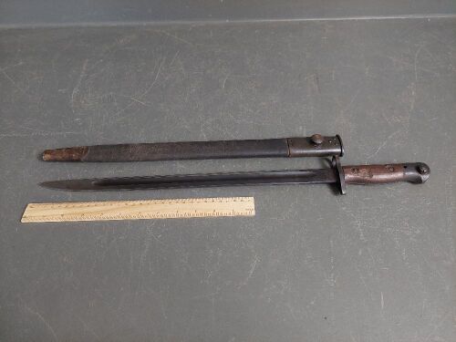 Australian Own gun sword bayonet and leather/metal scabbard - marked - numbered 2857 - 17in blade