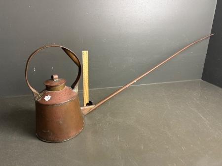 Vintage copper lubricator oil can with extra long spout