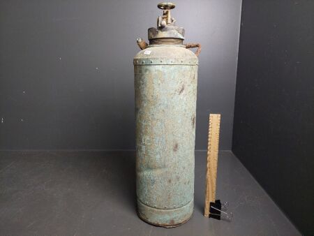 Antique brass/copper fire extinguisher - marked 1924 at base