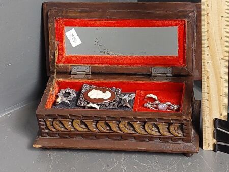 Vintage carved wooden jewellery box with cameo brooch, rings etc