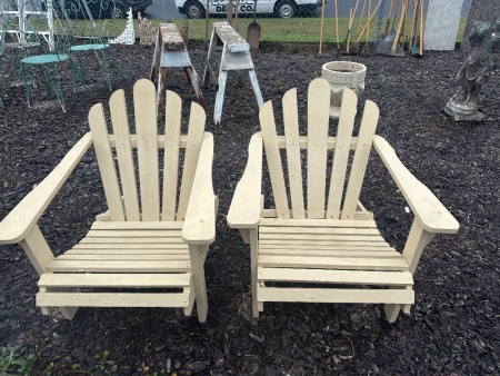 Pair of wooden settlers chairs 