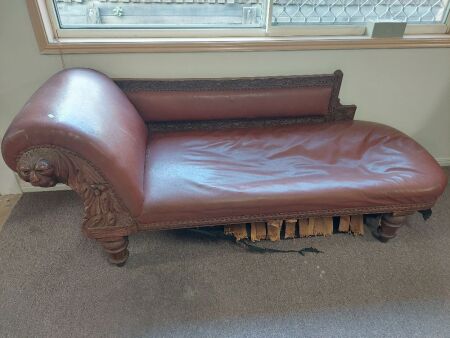 Carved Antique Leather Chaise on Turned Legs