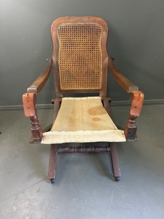 Antique Collapsable Armchair with Canvas Seat and Rattan Back