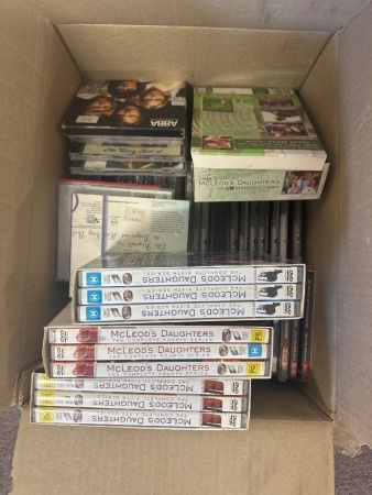 Box of Assorted DVDs and Cds