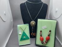 3 Necklaces - 1 Polished Wood and Ruby Trimmed - 1 Jade Triangle Pendant with Bronze Chain - 1 Retro Bronze Tone Abstact - 3