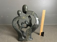 Stone Family Hug Sculpture 