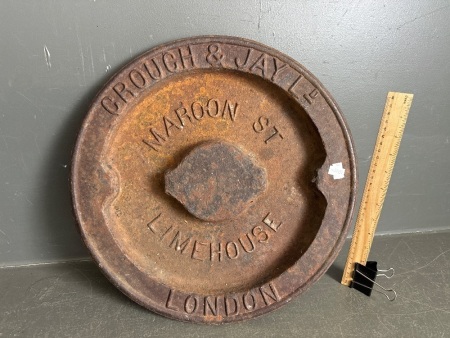 Vintage Cast Iron Tank LidCrouch and Jay Ld, Maroon St, Limehouse, London 