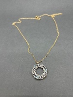 Clear and Light Blue Stones Hugs and Kisses Pendant - Gold Tone Necklace