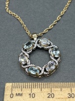 Clear and Light Blue Stones Hugs and Kisses Pendant - Gold Tone Necklace - 2