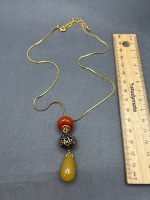 Triple Featured Pendent with Gold Trimmed Necklace 