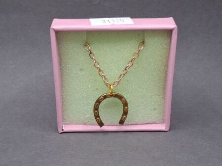 Elegant Gold-Tone Horseshoe Pendant