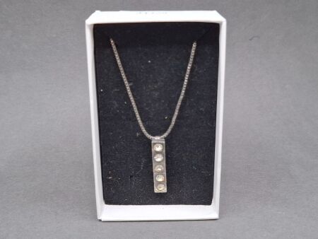 Elegant Silver-Tone Pendant with 5 Diamanté Bar Drop