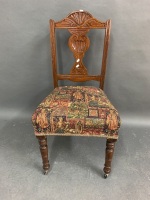 Antique Upholstered Bedroom Chair on Turned Front Legs with Original Castors